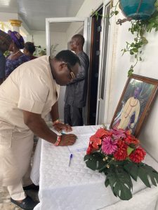 Hon.-Chief-Thomas-Ereyitomi-JP-Signing-The-Condolence-Register.jpg