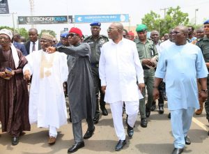 Governor  Ifeanyi Okowa(2nd left) showing  a place  of interest  on Maryam Babangida  Way  in Asaba on Thursday to his Sokoto  State  counterpart, Aminu Tambuwal  when the  latter  visited Delta  to Inaugurate the  road and another.  With  them are Deputy Governor,  Barr. Kingsley Otuaro (2nd left), and Speaker,  DTHA, RT. Hon. Sheriff  Oborevwori 