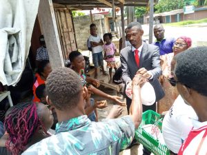 The founder/Chief Executive Officer of LGD, PST Emmanuel Irame Distributing Food Items