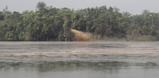 One Of The Wellheads Pumping Out Crude Oil Into Amuokpokpor-Elume Community River