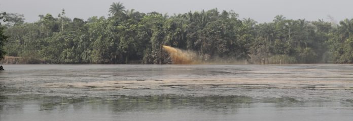 One Of The Wellheads Pumping Out Crude Oil Into Amuokpokpor-Elume Community River