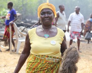 Farmer Displaying Her Fish Net